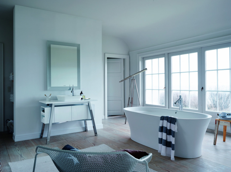 Modern bathroom design featuring a stylish freestanding tub and sleek vanity.