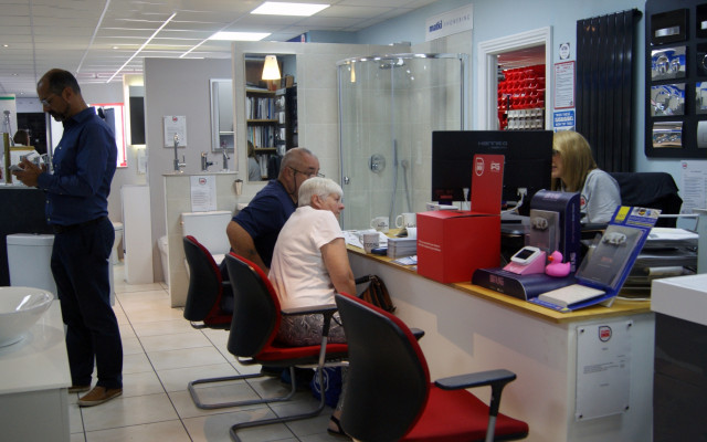 Plumb Inn Bathroom Showroom - Customers Discussing With A Team Member